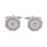 A pair of mother of pearl and diamond cufflinks,   the octagonal mother of pearl panels centrally