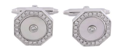 A pair of mother of pearl and diamond cufflinks,   the octagonal mother of pearl panels centrally