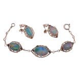 An opal doublet bracelet and ear pendents  , the bracelet with three graduated opal doublets within