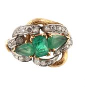 An emerald and diamond dress ring,   the central rectangular shaped emerald in a four claw setting,