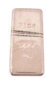 A one kilo silver coloured bar,   stamped Fine Silver 999 1KG, 12cm high