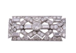 An Art Deco diamond brooch,   circa 1930, the pierced rectangular panel set with old brilliant and