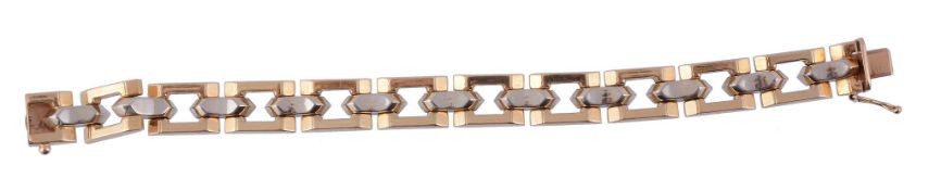 An Italian two colour bracelet,   the pierced rectangular panels with shaped bars between, stamped