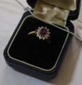 An 18ct gold, diamond and pink sapphire ring