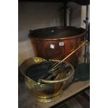 A Victorian copper log basket, a pair of painted bellows, brass coal bucket and fire iron and tongs