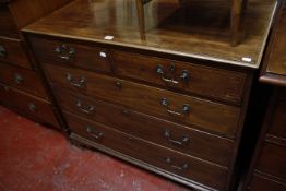 An Edwardian mahogany chest,  the rectangular moulded top above  two short and three boxwood