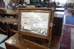 A George III mahogany firescreen, an early 19th century mahogany dressing mirror, two further