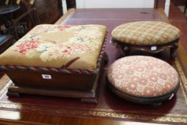 A group of three foot stools and covered in needlework covers