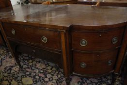 A mahogany breakfront sideboard, George III, with two central drawers and flanked by a cupboard
