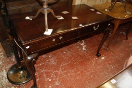 A George III style mahogany side table with two frieze drawers on cabriole legs with ball and claw