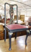 A 18th Century style japanned and gilt decorated chair with drop in seat