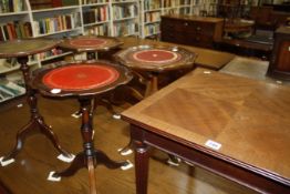 A nest of tables, four Georgian style wine tables and a further occasional table