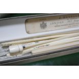 A mother of pearl and lace fan in original box, six chopsticks, a crochet hook and an ivory