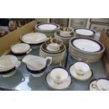 A Wedgwood & Co. 'Imperial Porcelain' part dinner service; fifty seven plates total, thirteen bowls,