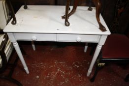 A distressed painted side table with two drawers 90cm wide