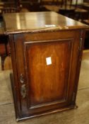 A 19th century mahogany stationery cabinet 37cm high, 27cm wide