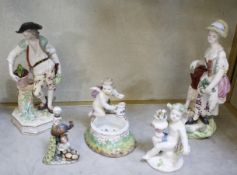 A pair of porcelain figures of male and female gardeners, a putti figure, a cherub and a scent