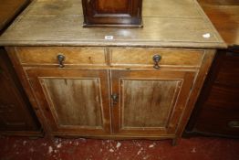 A 19th Century French provincial cupboard with two drawer and a cupboard 97cm wide