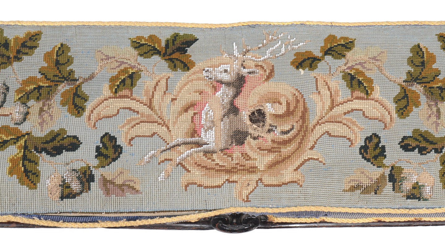 A fireside stool, 19th century, the tapestry top with oak leaf motifs and three cartouches each with - Image 2 of 2