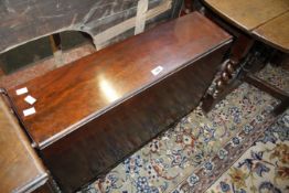 A 19th Century mahogany dropleaf table on ring turned legs joined by stretchers 76cm wide  Best Bid
