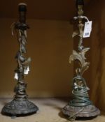 A pair of 19th Century French ormolu candle holders (adapted for lighting) (sold as parts).