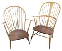 A beech Ercol Windsor style armchair with an elm seat, together with a similar example with a