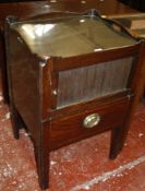 A George III mahogany tray top commode with a tambour front cupboard 78cm high, 49cm wide