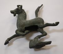 An Oriental metal model of a horse, 12cm high Best Bid