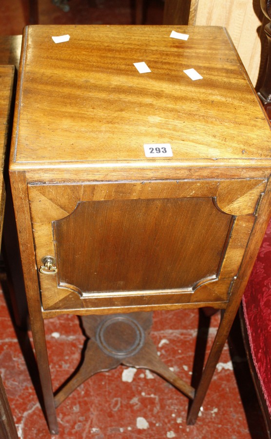 A George III mahogany pot cupboard, the legs joined by stretcher 32cm wide