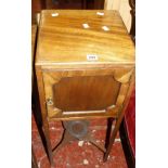 A George III mahogany pot cupboard, the legs joined by stretcher 32cm wide