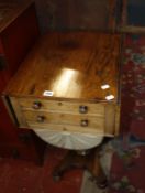 A 19th Century rosewood work table with two frieze drawers and a work basket, turned column and