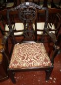 A George III mahogany chair with eagle arm supports and drop in seat