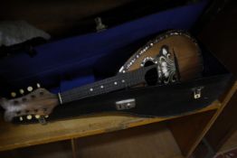 A mandolin in case (af) Best Bid