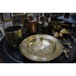 A quantity of assorted brass and copperware, to include a large collection plate, a preserve pan,