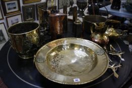 A quantity of assorted brass and copperware, to include a large collection plate, a preserve pan,