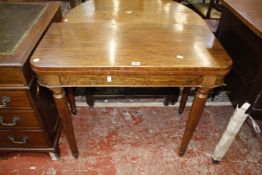 A 19th century mahogany card table on tapering legs 91cm wide