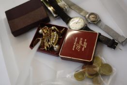 A small quantity of costume jewellery, two watches, lighters and a small quantity of coins  Best