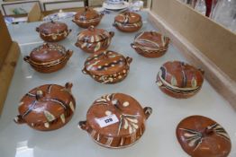 Ten Mexican terracotta lidded pots (one extra lid) Best Bid