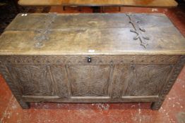 A Charles II panelled oak chest 138cm wide