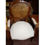 A French 18th century style cane chair and a cane tub bergere  Best Bid