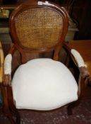A French 18th century style cane chair and a cane tub bergere  Best Bid