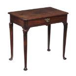 A George II mahogany side table,   circa 1750, the moulded rectangular top above the frieze drawer,