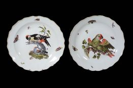A pair of large Meissen chargers,   circa 1745, one painted with a spotted woodpecker and scattered