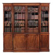 A George III mahogany breakfront library bookcase  , circa 1790,  the moulded cornice above central