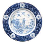 A London delft powdered-blue bordered blue and white chinoiserie plate,   mid 18th century,