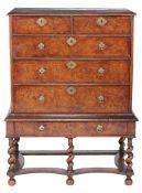 A William  &  Mary pollard oak chest on stand,   circa 1690, with holly stringing throughout, the