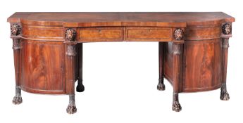 A George III mahogany breakfront sideboard,   circa 1800,  in the manner of Thomas Hope, the