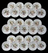 Twenty-seven Meissen ornithological dessert plates with ozier-moulded borders,   late 19th century,