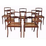 A set of fourteen Regency mahogany dining chairs  , circa 1815, to include four armchairs, each