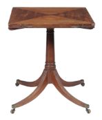 A George III mahogany folding envelope card table,   circa 1790, the top incorporating four hinged